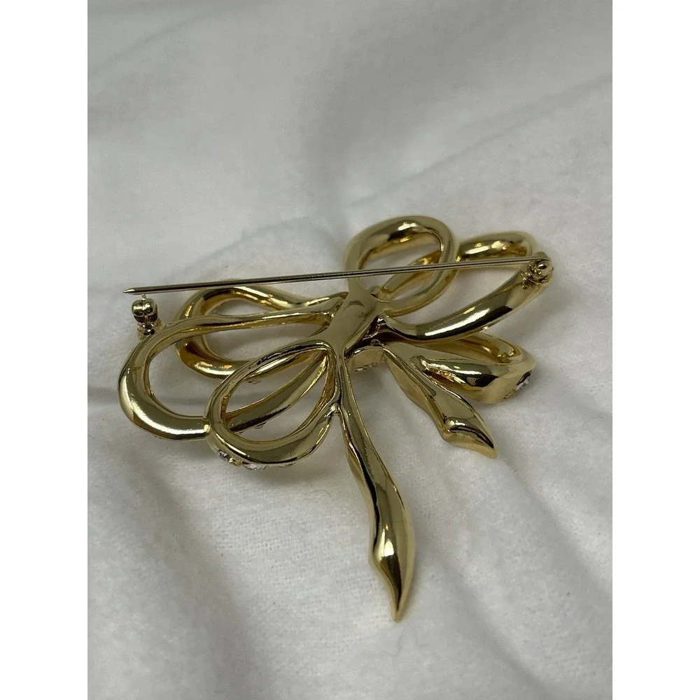 Vintage KJL For Avon Bow Pin Brooch Crystal Gold Tone Kenneth Jay Lane 2 3/4 In.